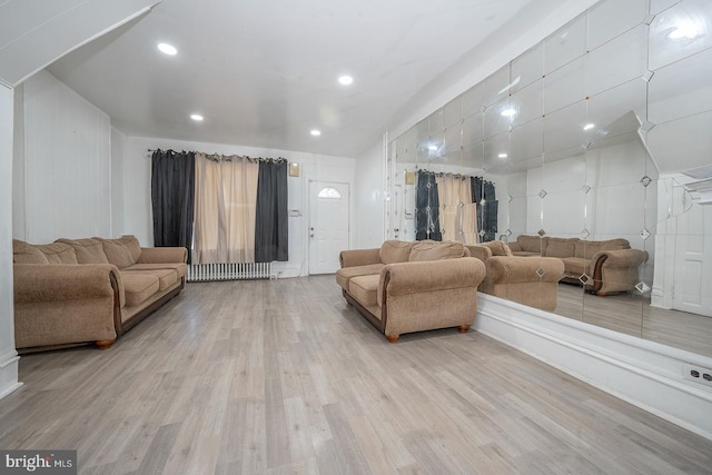 living room with light hardwood / wood-style floors