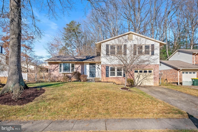 view of front of property with a front lawn and a garage