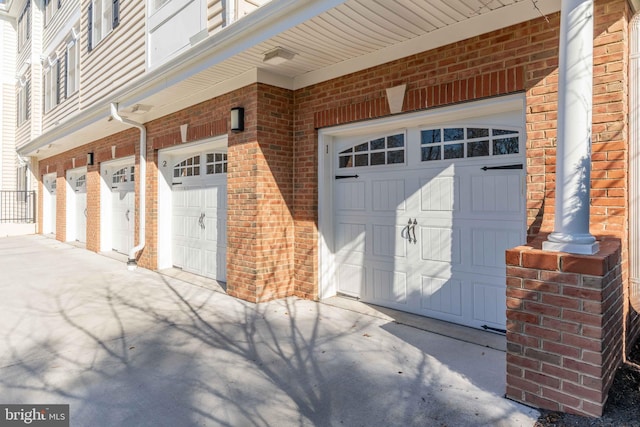 view of exterior entry with a garage