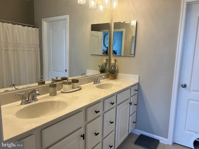 bathroom featuring vanity and tile patterned floors