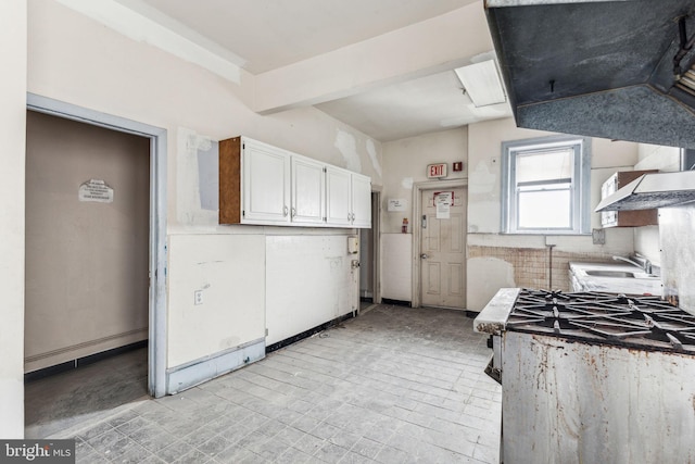 kitchen with sink and white cabinets