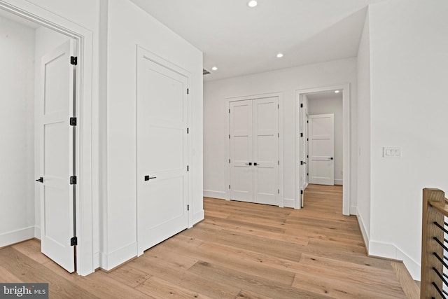 corridor featuring light wood-type flooring