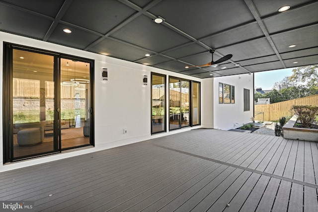 wooden terrace featuring ceiling fan