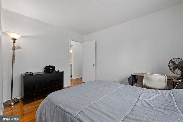 bedroom with light hardwood / wood-style flooring