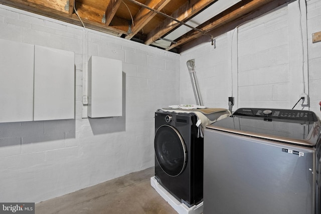 laundry room featuring separate washer and dryer