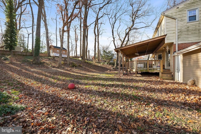 view of yard featuring a deck