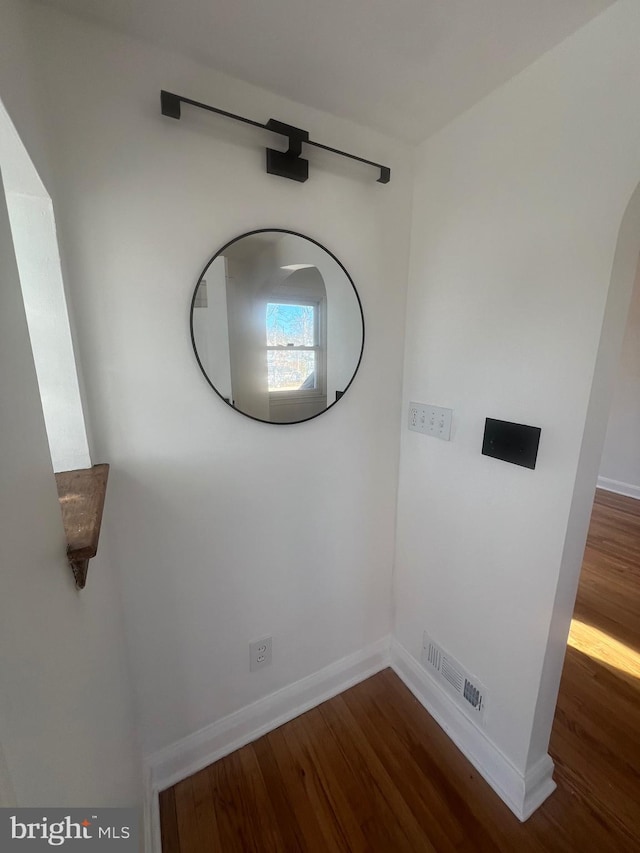 interior space with dark hardwood / wood-style flooring