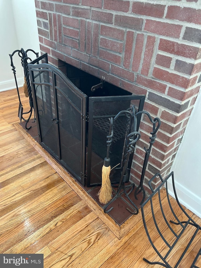 interior details featuring hardwood / wood-style floors