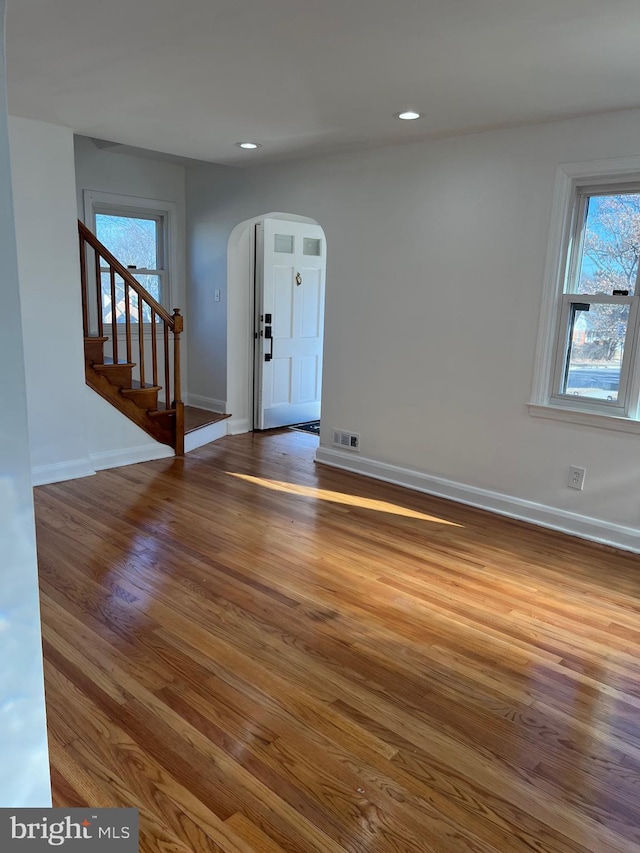 foyer with dark hardwood / wood-style flooring