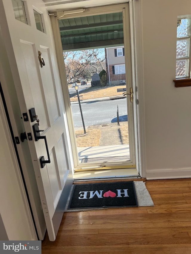 doorway featuring hardwood / wood-style flooring