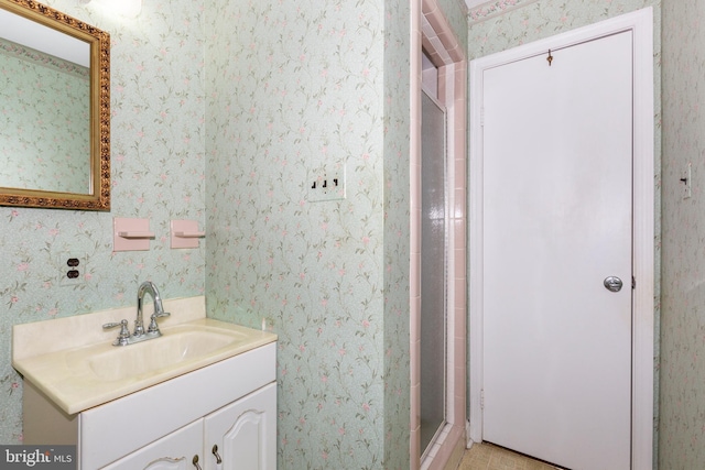 bathroom featuring vanity and walk in shower