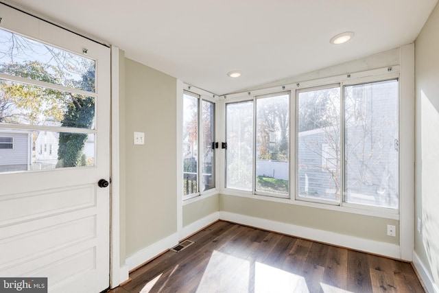 unfurnished sunroom with plenty of natural light