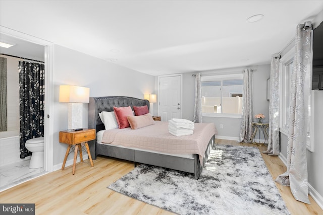 bedroom featuring light hardwood / wood-style flooring