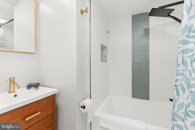 bathroom with vanity and shower / tub combo