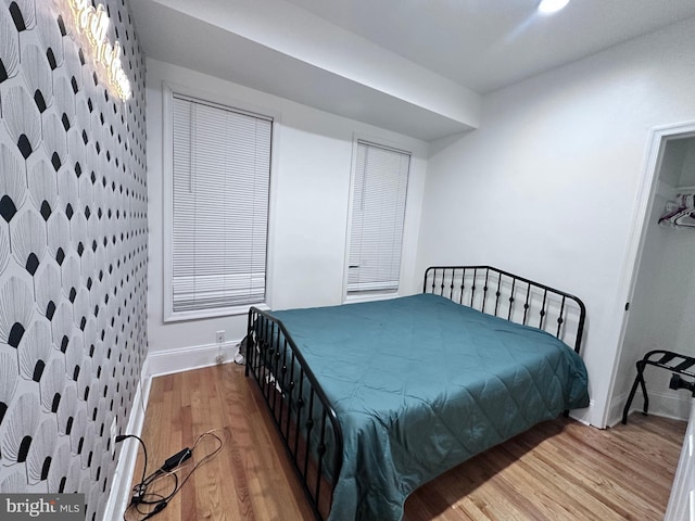 bedroom featuring light wood-type flooring