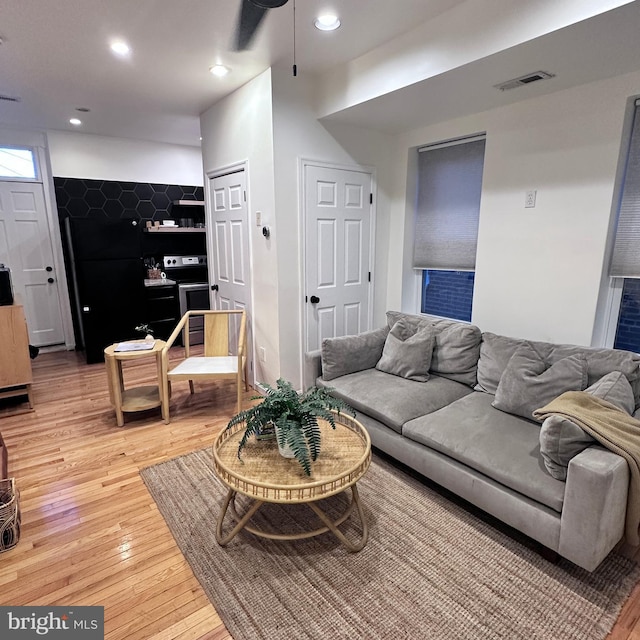 living room with hardwood / wood-style flooring