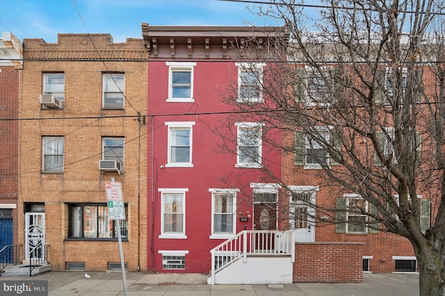 view of front facade with cooling unit