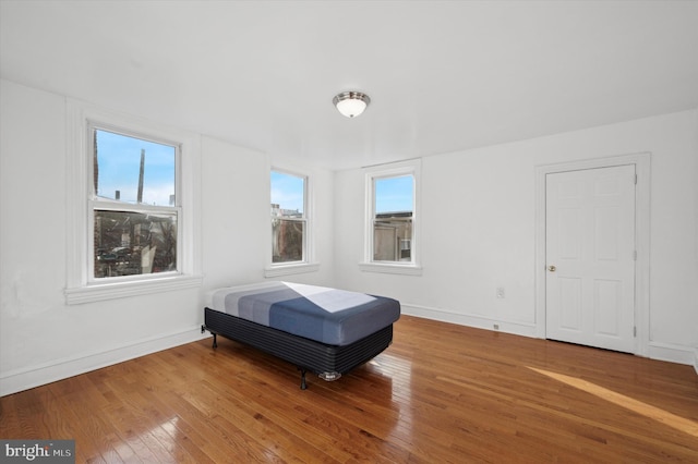 bedroom featuring wood-type flooring