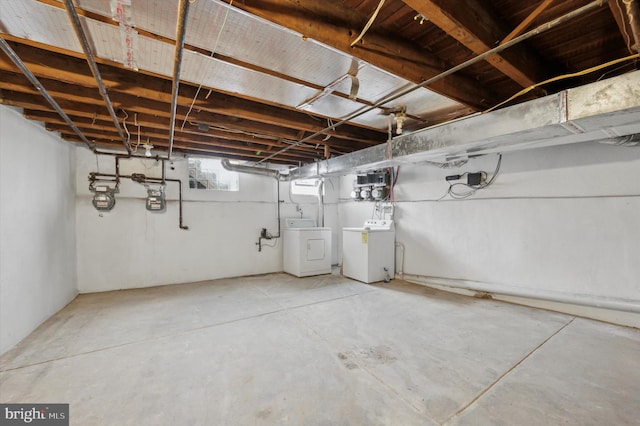 basement featuring washing machine and dryer