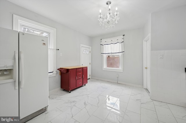 interior space with a chandelier