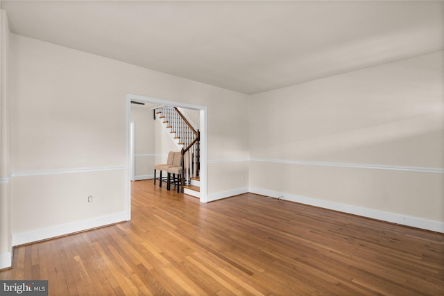 empty room featuring hardwood / wood-style flooring