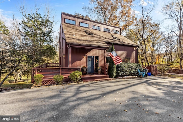 view of front of home with a wooden deck