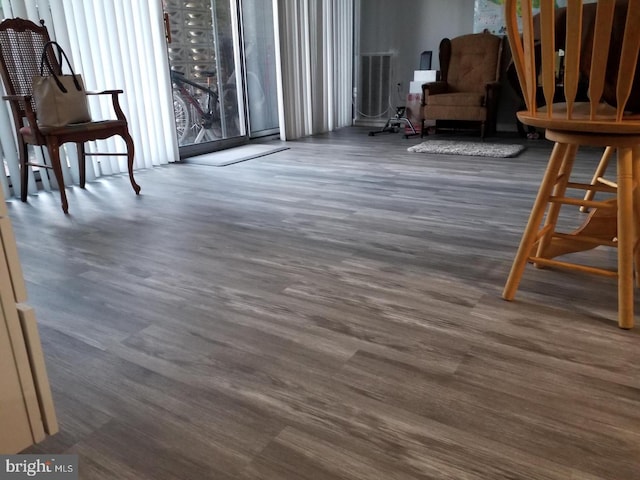 sitting room featuring dark hardwood / wood-style floors