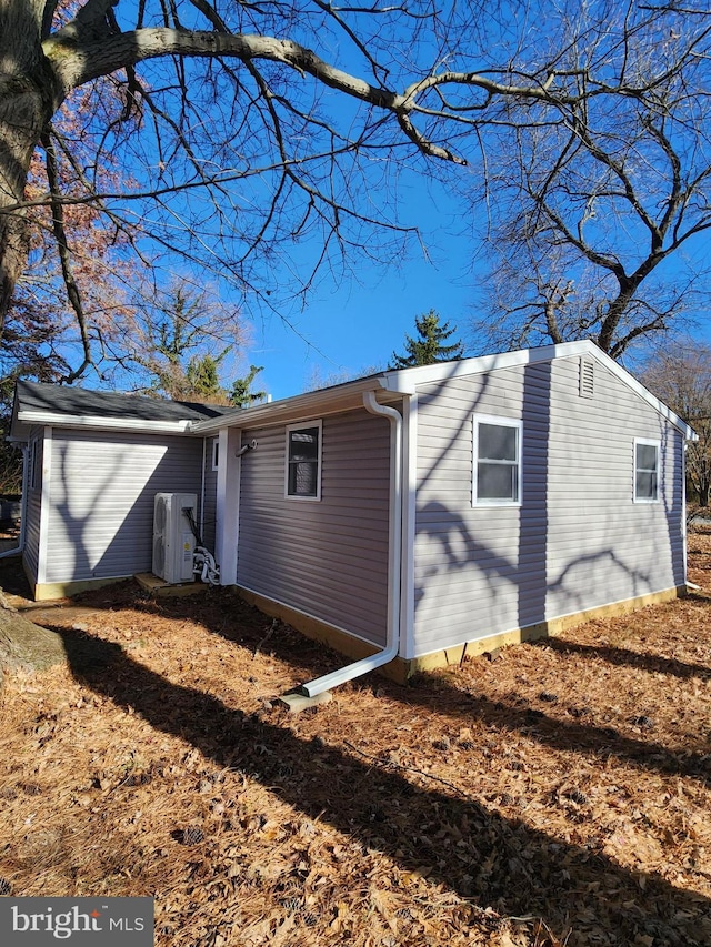 exterior space with ac unit