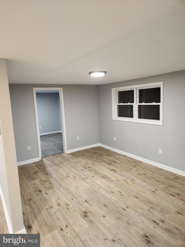 unfurnished room featuring light hardwood / wood-style flooring