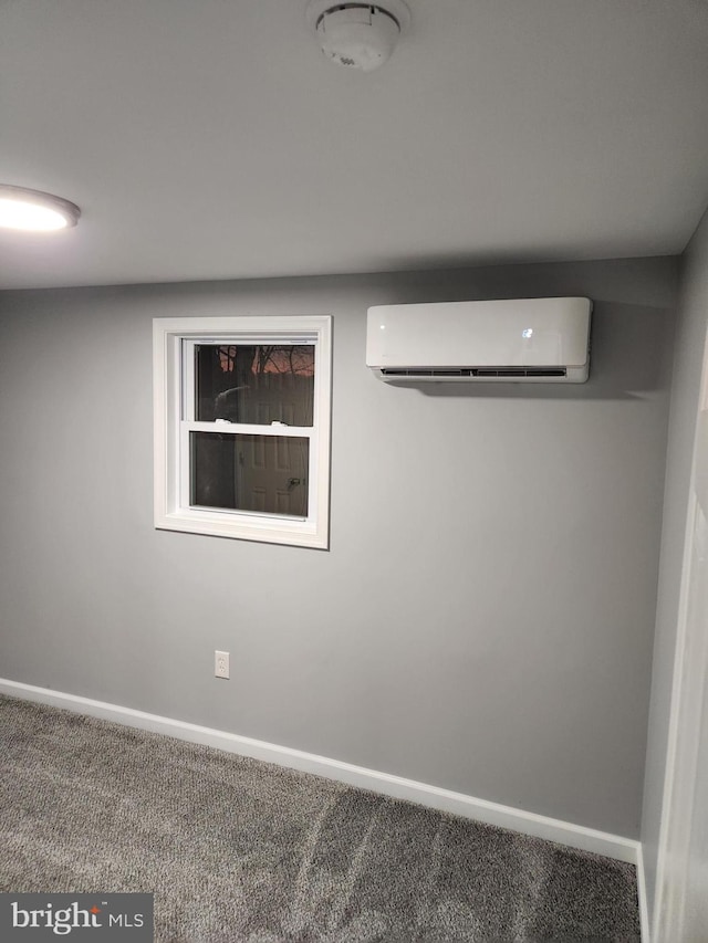 interior space with a wall mounted AC