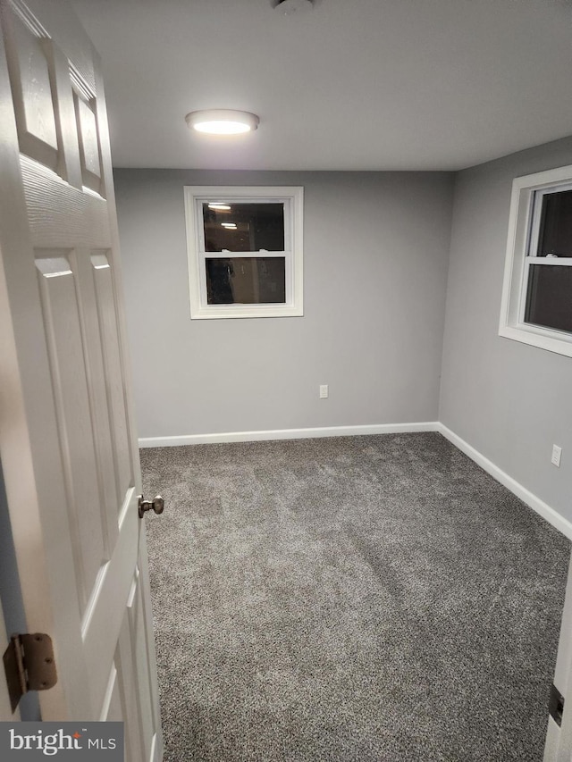 unfurnished room with carpet