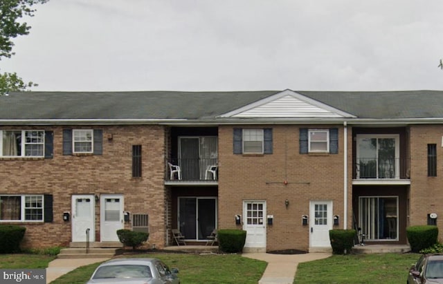 view of property with a front yard