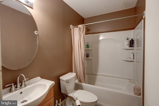 full bathroom featuring shower / bath combination with curtain, vanity, and toilet