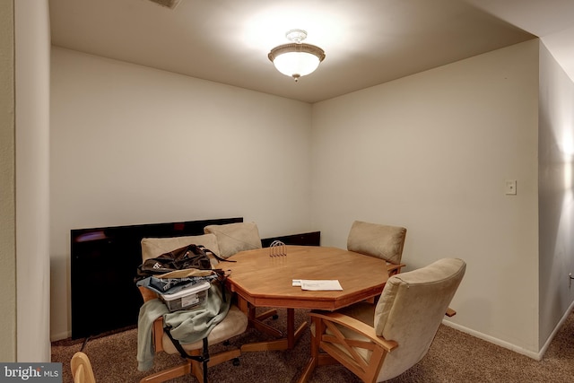 dining room with carpet flooring