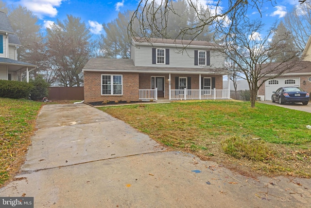 front of property with a front lawn and covered porch