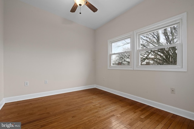 unfurnished room featuring ceiling fan and hardwood / wood-style flooring