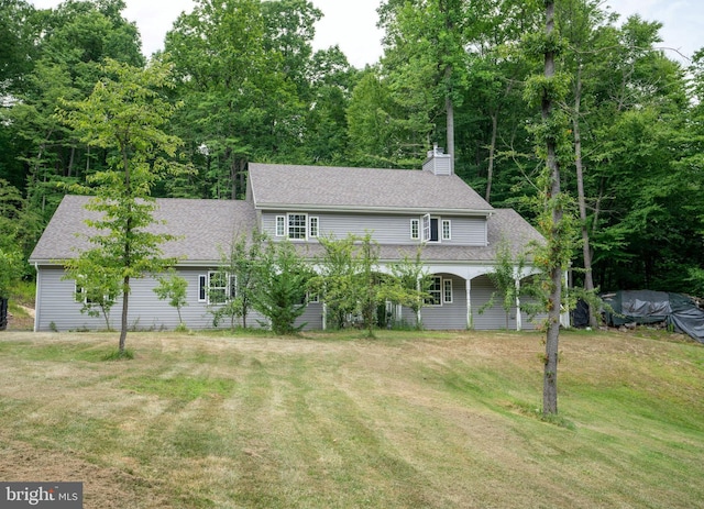 view of front of home featuring a front yard