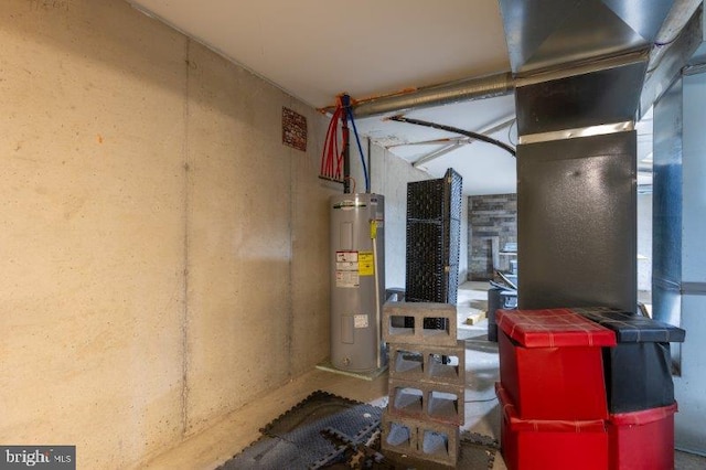 utility room featuring electric water heater