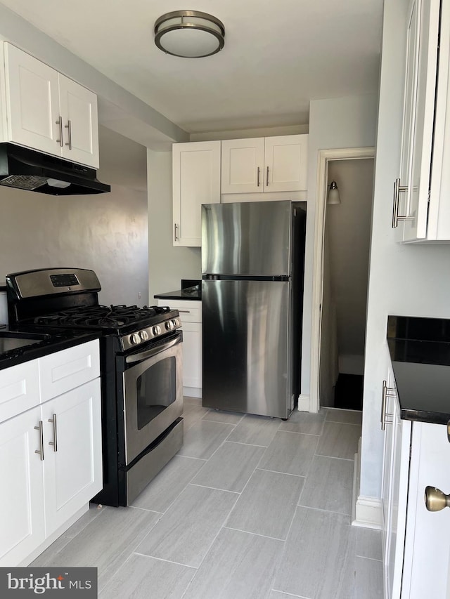 kitchen with white cabinetry and stainless steel appliances