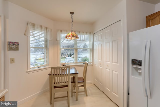 dining area with a wealth of natural light