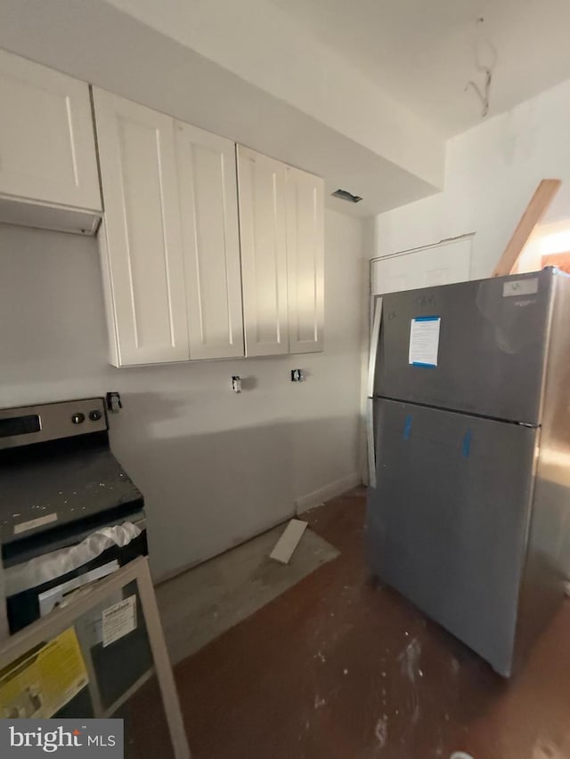 kitchen featuring white cabinetry and stainless steel appliances