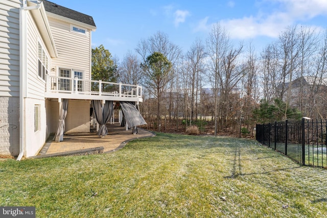 view of yard with a patio area and a deck