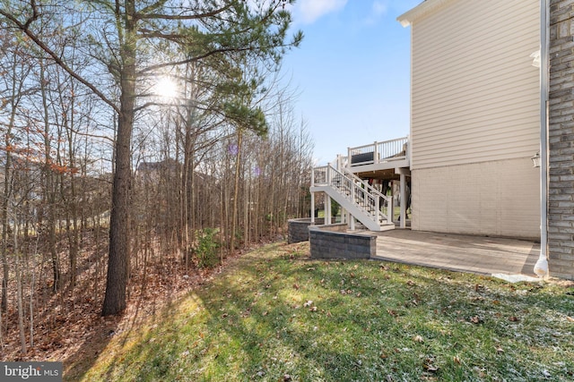 view of yard with a deck