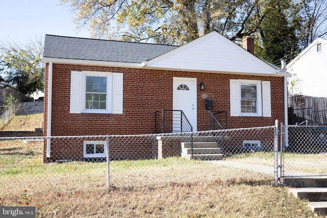 bungalow featuring a front yard