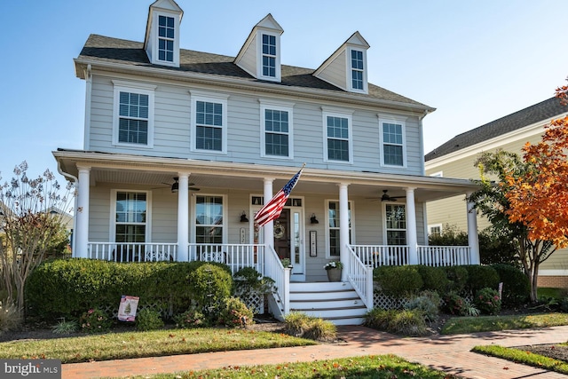 view of front of home with ceiling fan and covered porch