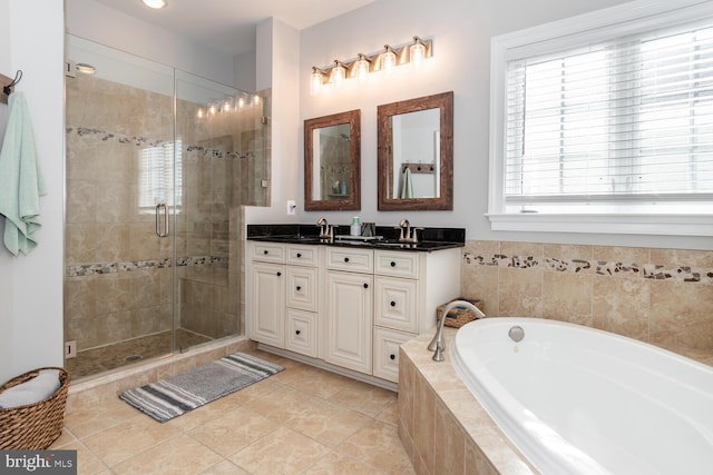 bathroom featuring vanity, tile patterned floors, and independent shower and bath