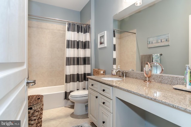 full bathroom with toilet, vanity, tile patterned floors, and shower / bath combo with shower curtain