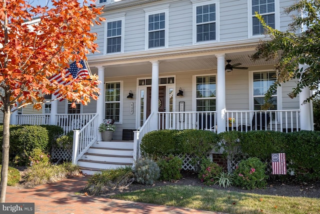 view of front of home with ceiling fan and covered porch