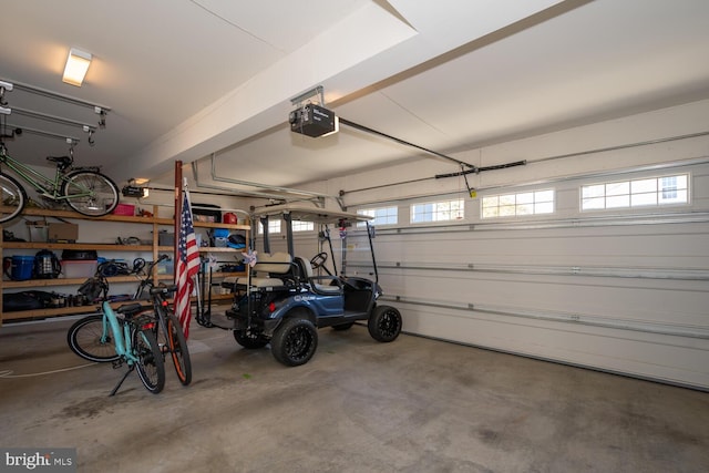 garage featuring a garage door opener