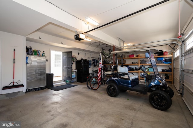 garage featuring a garage door opener